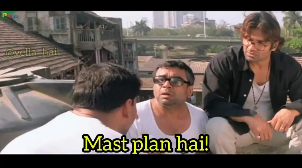 Scene from a Bollywood film showing three men engaged in a serious conversation with the caption 'Mast plan hai!' This reflects a moment of strategic discussion, similar to the meticulous preparation required for an FP&A interview where candidates must plan their approach to common questions, behavioral situations, and technical assessments